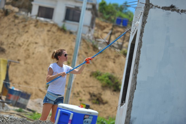 Faye – Employee volunteers painting